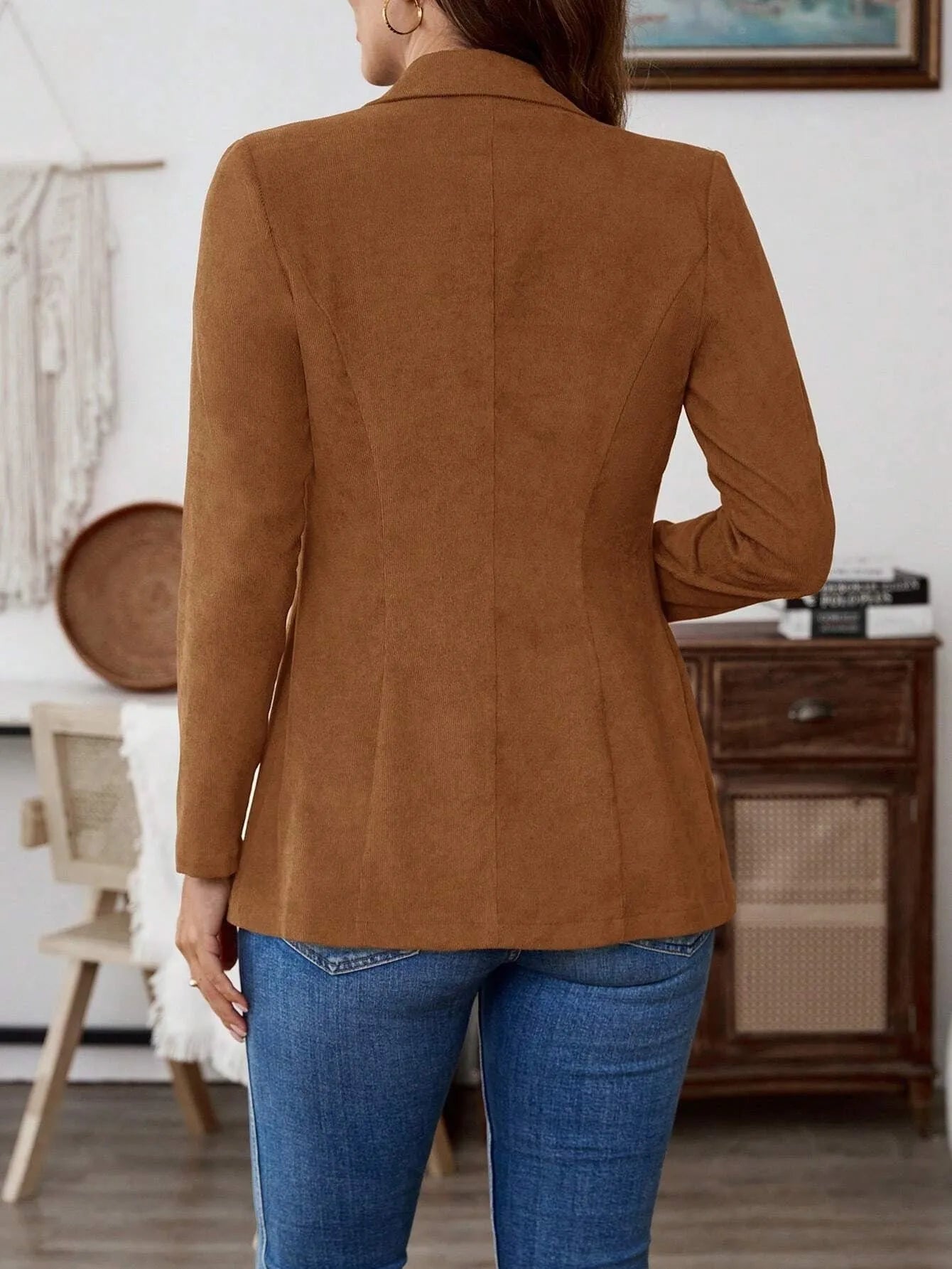 Brown men's casual suit coat with notch lapels, long sleeves, and a single-breasted button fastening.