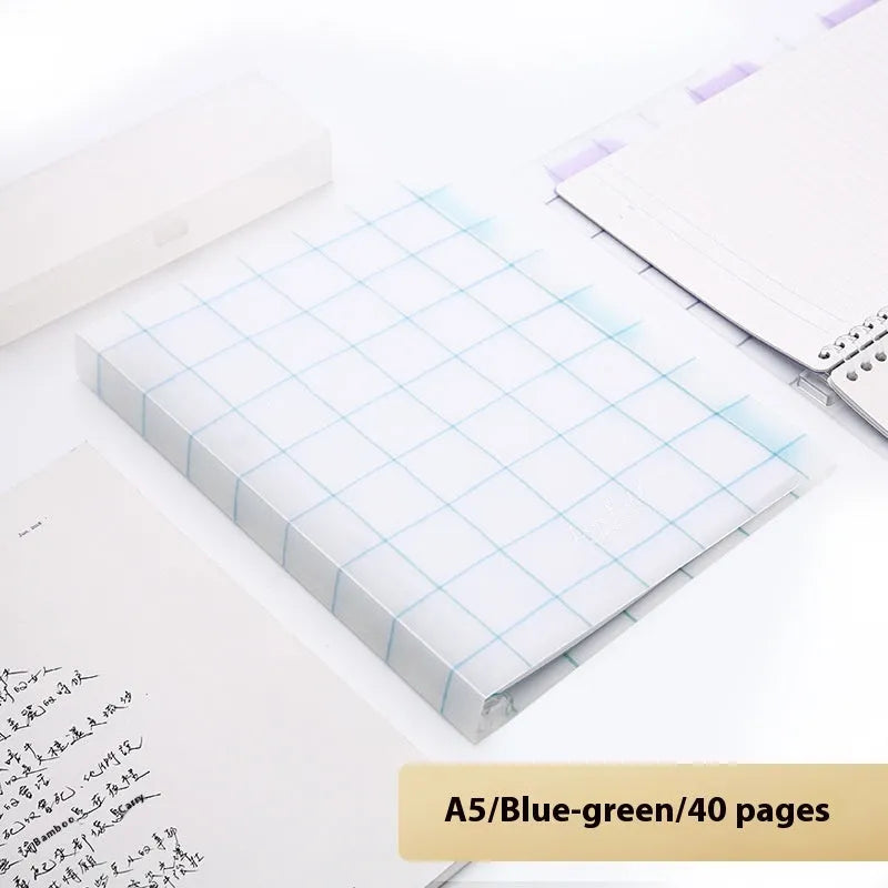Loose-leaf spiral notebook with PP cover open, showing raw wood pulp pages in A5 or B5 size.