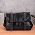 Black Korean-style men's anti-theft backpack with PU leather exterior and contrast stitching