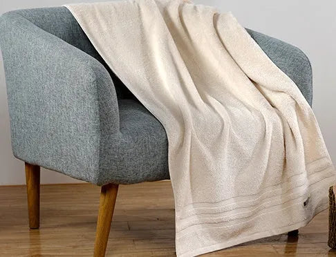 Cotton towel set in beige and brown with 395 GSM weight including bath towel, hand towel, and face cloth
