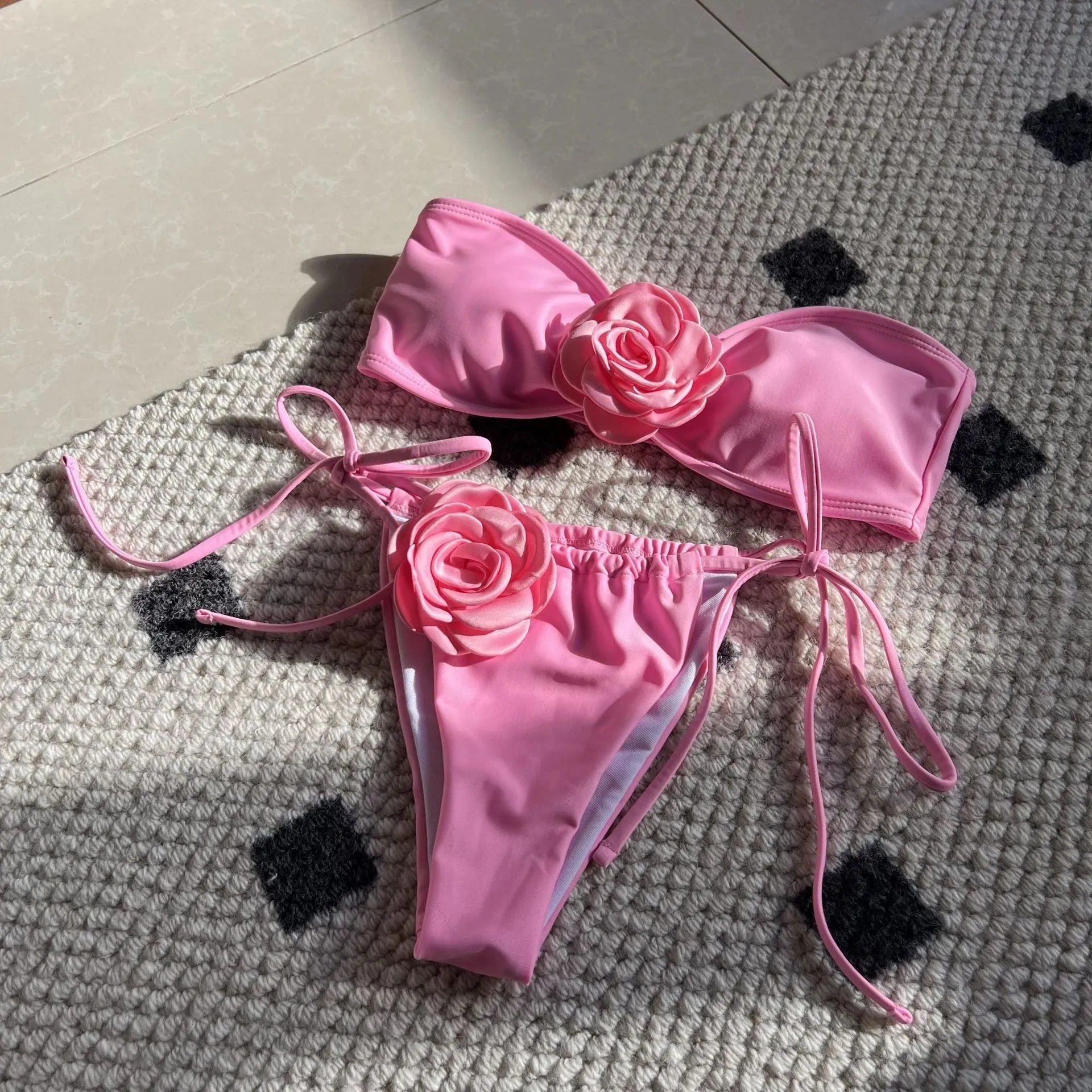 Solid colour rose tube top one-piece swimsuit for women with an adjustable drawstring strap and split style briefs.