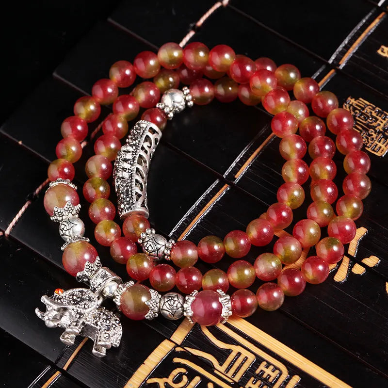 Watermelon crystal bracelet with Chinese knot design in 6mm or 8mm elephant style beads