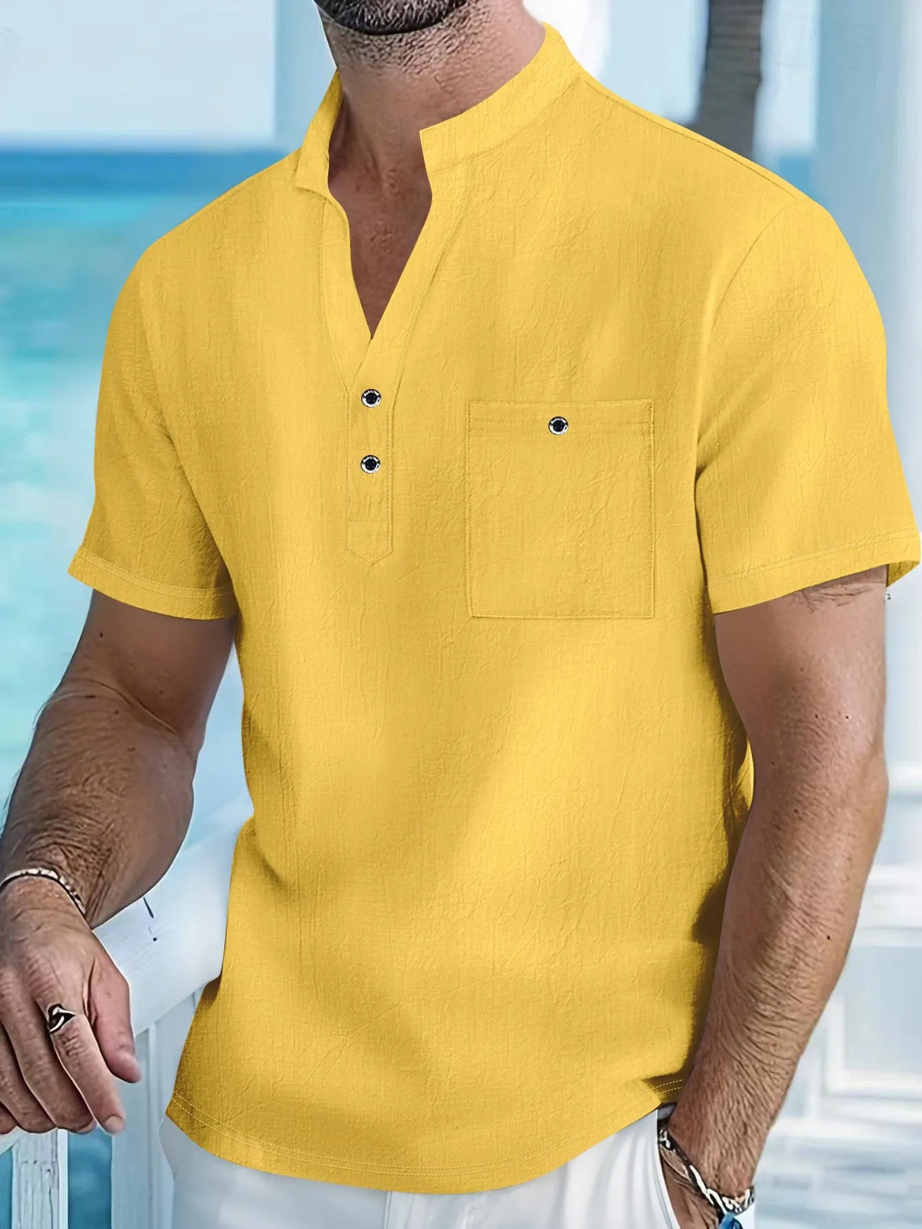 Men's light blue stand collar linen short sleeve T-shirt laid flat, showing loose fit and solid colour.