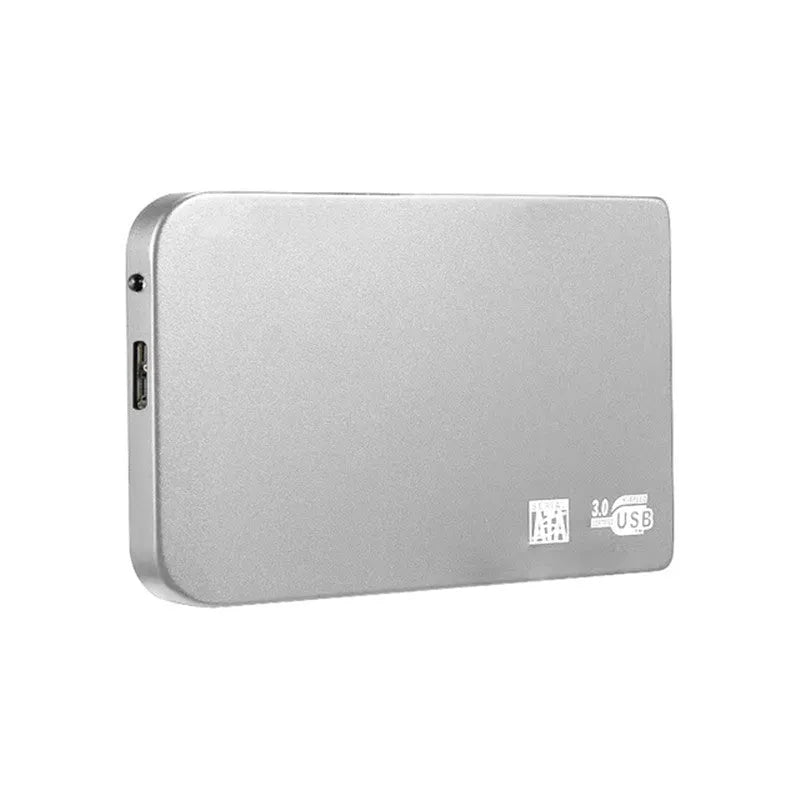 Silver metal external solid state drive with USB cable and cover next to packaging.