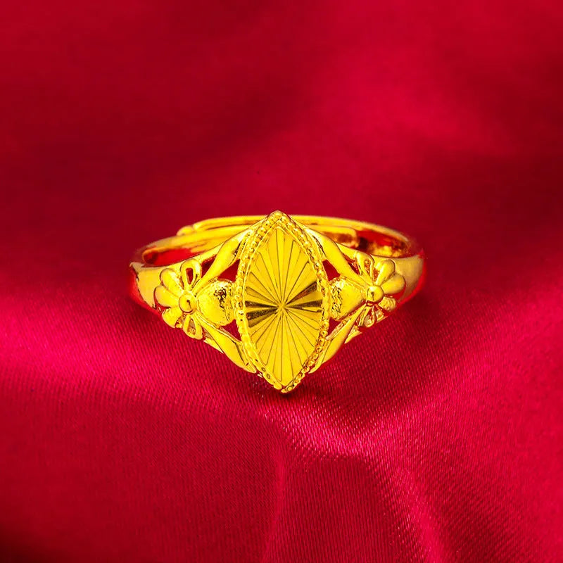 Geometric open ring with textured diamond flower pattern in electroplated gold finish