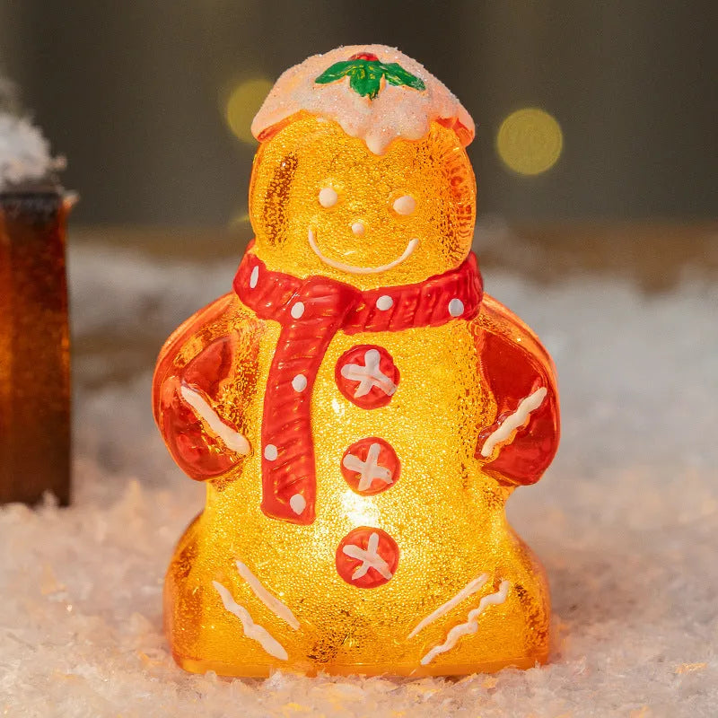 Glowing gingerbread man Christmas ornament with snowman design in four scarf colour options