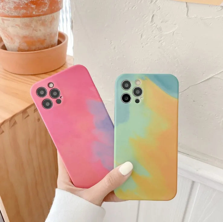 Soft silicone iPhone case with blue and purple oil painting gradient and white geometric abstract pattern.