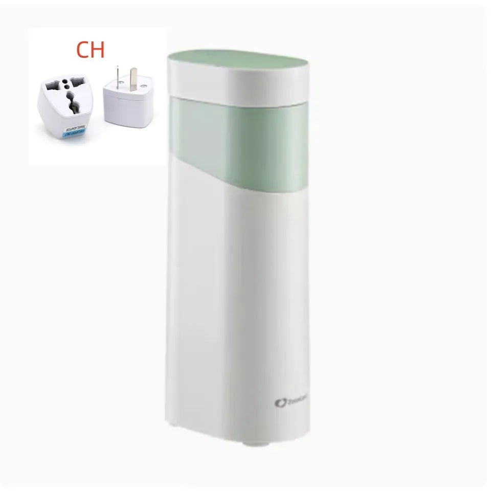 Black and green portable desktop instant water dispenser with digital display and small tank.