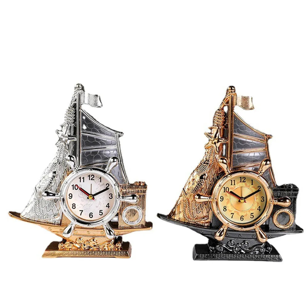 Creative contemporary alarm clock in a choice of gold or silver finish for home decor.