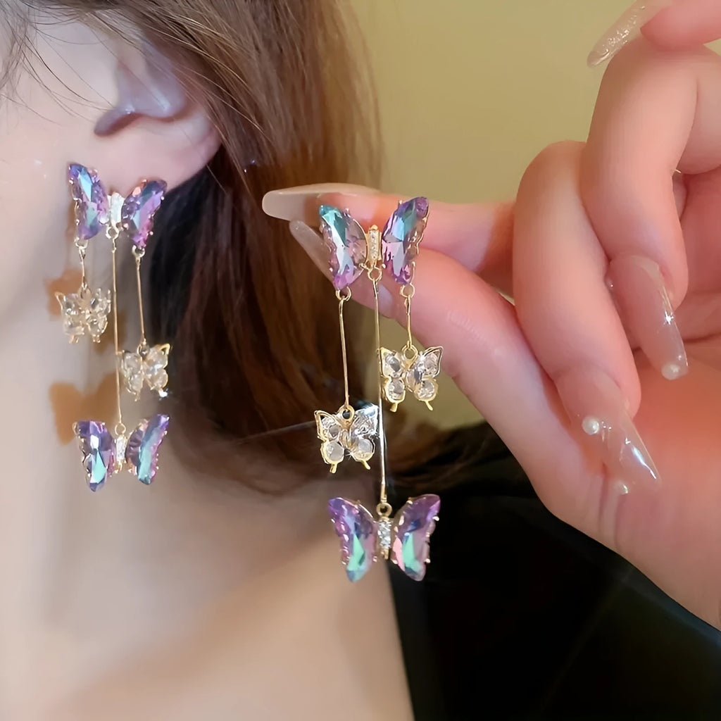 Silver needle electroplated alloy earrings with blue purple butterfly tassel and crystal flower details