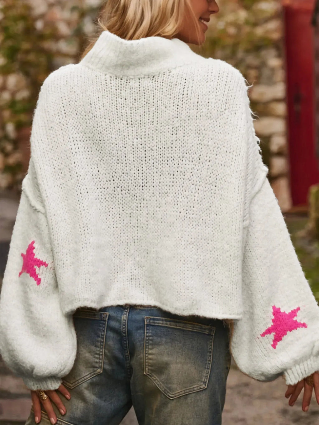 White women's loose turtleneck pullover sweater with five-pointed star pattern