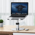 Silver adjustable aluminium car laptop stand with rotating base and non-slip pads.