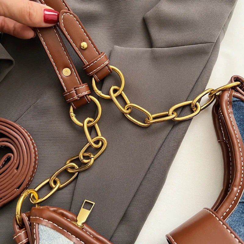 Brown denim bucket shoulder bag with diamond mesh pattern and chain decorative elements