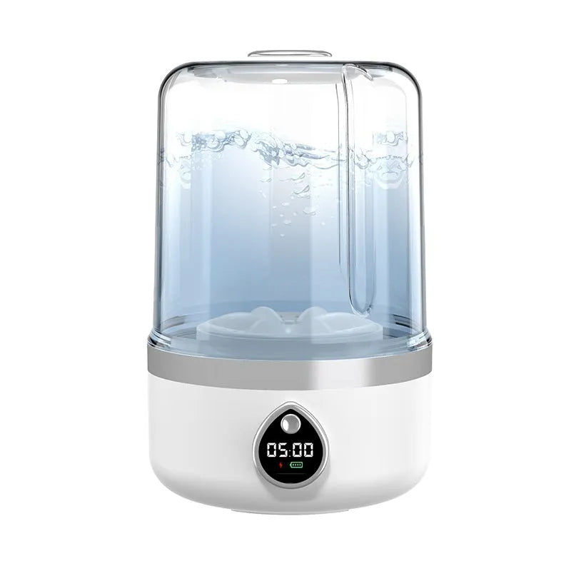 White portable USB charging mini washing machine with compact plastic housing on a countertop.