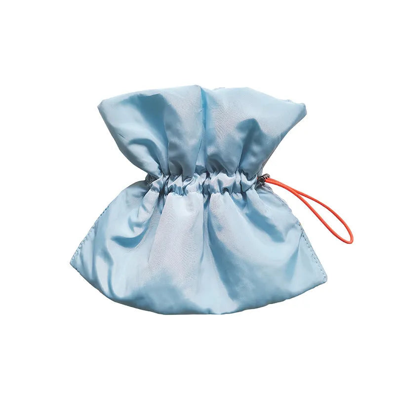 Adjustable soft cat cone collar in light blue protecting wound while allowing eating access