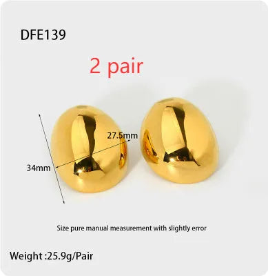 Geometric women's earrings with a gold glazed finish and simple line designs on a white background.