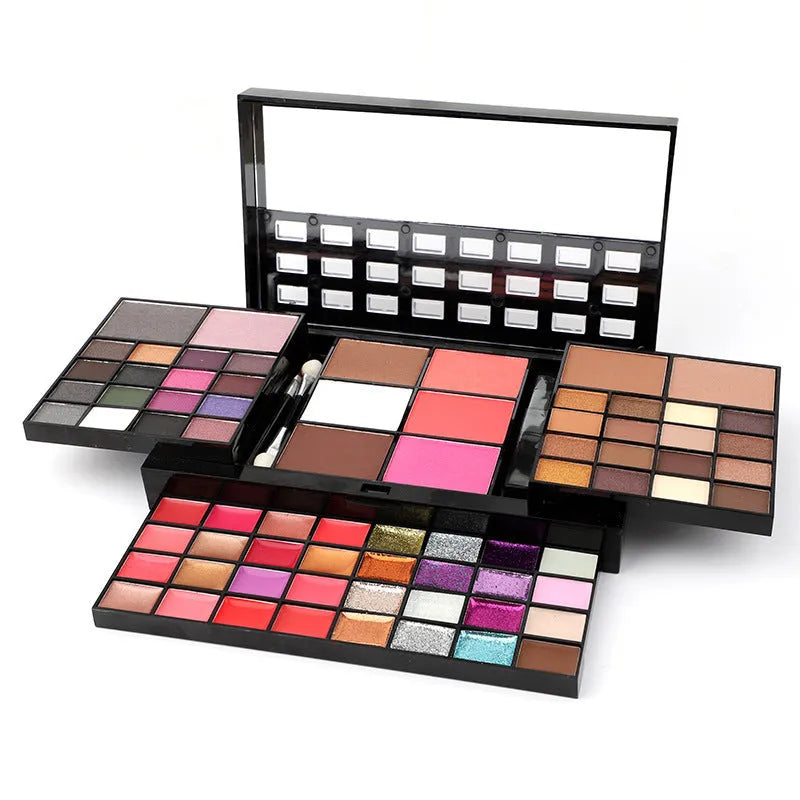 74 colour makeup palette set with four layers showing eyeshadows, lip glosses, and face powders with brushes