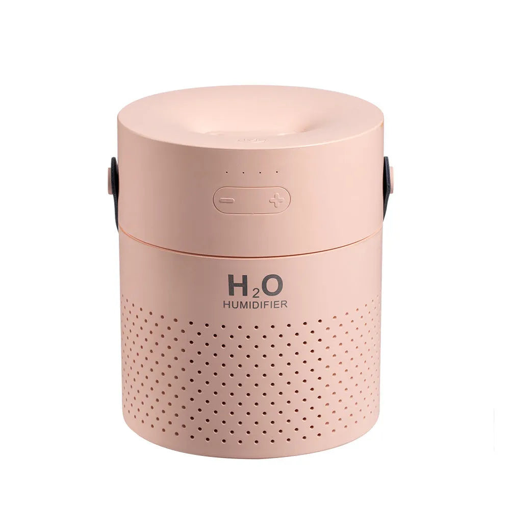 Slim USB rechargeable humidifier with water tank and colour options on a bedside table.