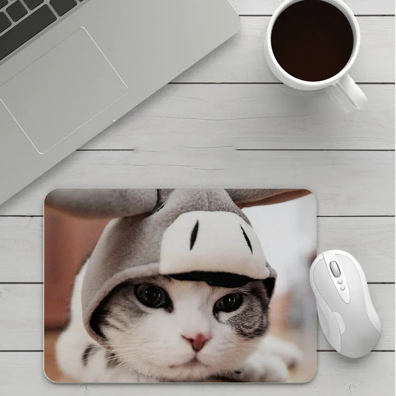 Custom cartoon mouse pad with thickening, showing example artwork on non-slip rubber and cloth base.