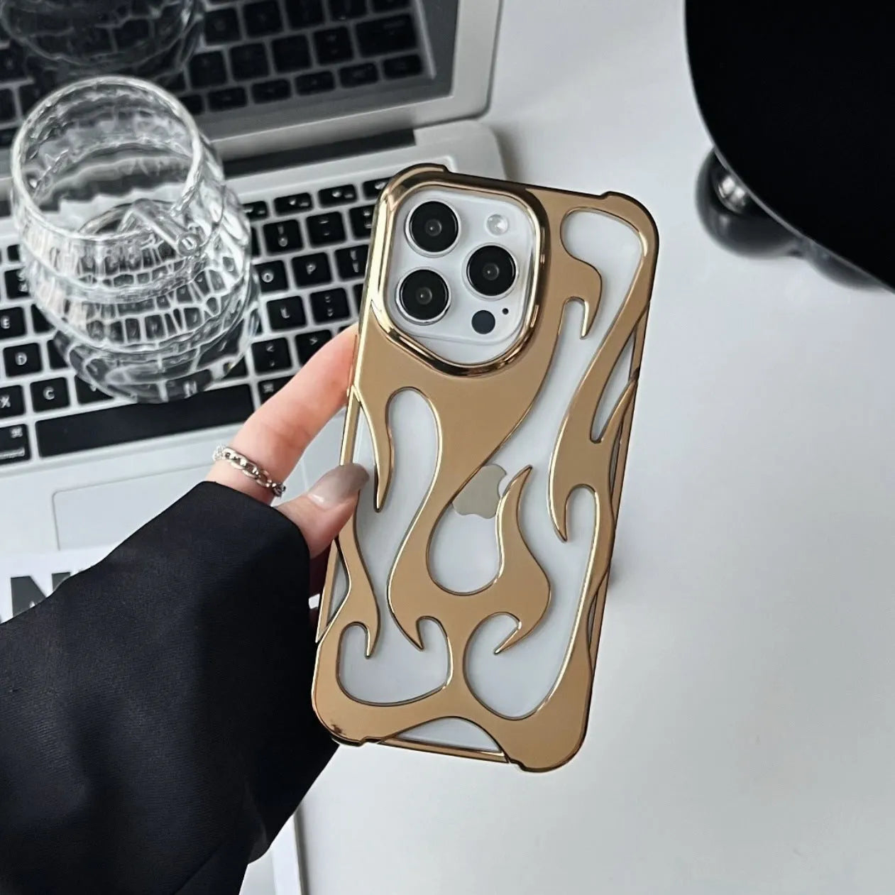 Electroplated hollow flame pattern iPhone case in silver with TPU soft shell construction