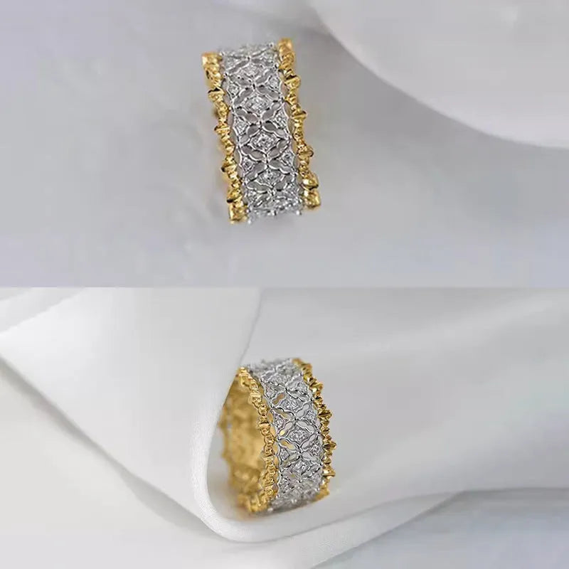 Geometric copper zircon ring with two-tone gold electroplating showing round centre stone