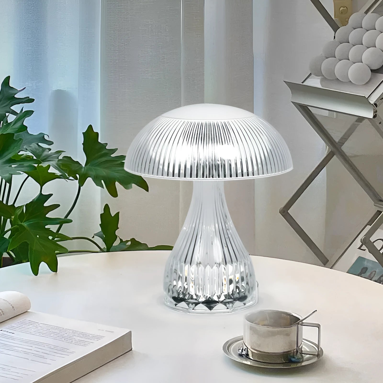 USB rechargeable bedside lamp with touch control and three-colour LED light on tabletop