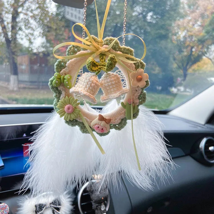 Woven wool bell orchid car pendant in green, pink, purple, and yellow colour options with dream catcher variations