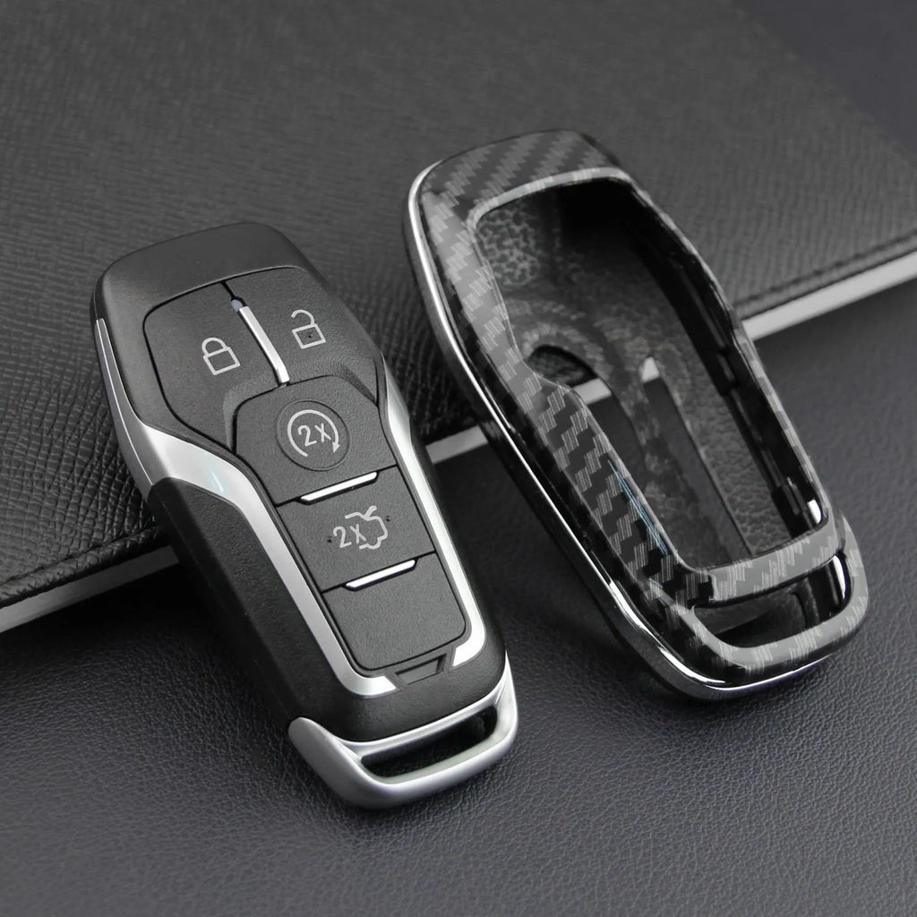 Hard plastic car key remote protective shell shown in single shell and buckle attachment variants