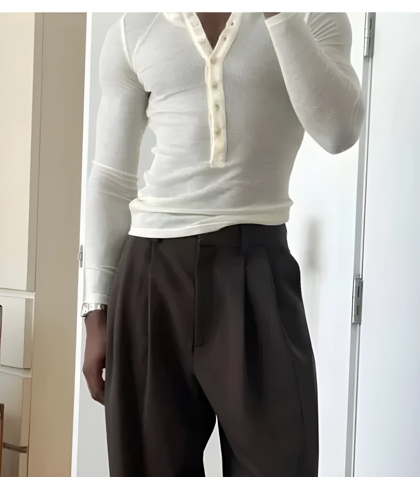 Men's cream ribbed long-sleeve henley top with three-button placket in apricot colour