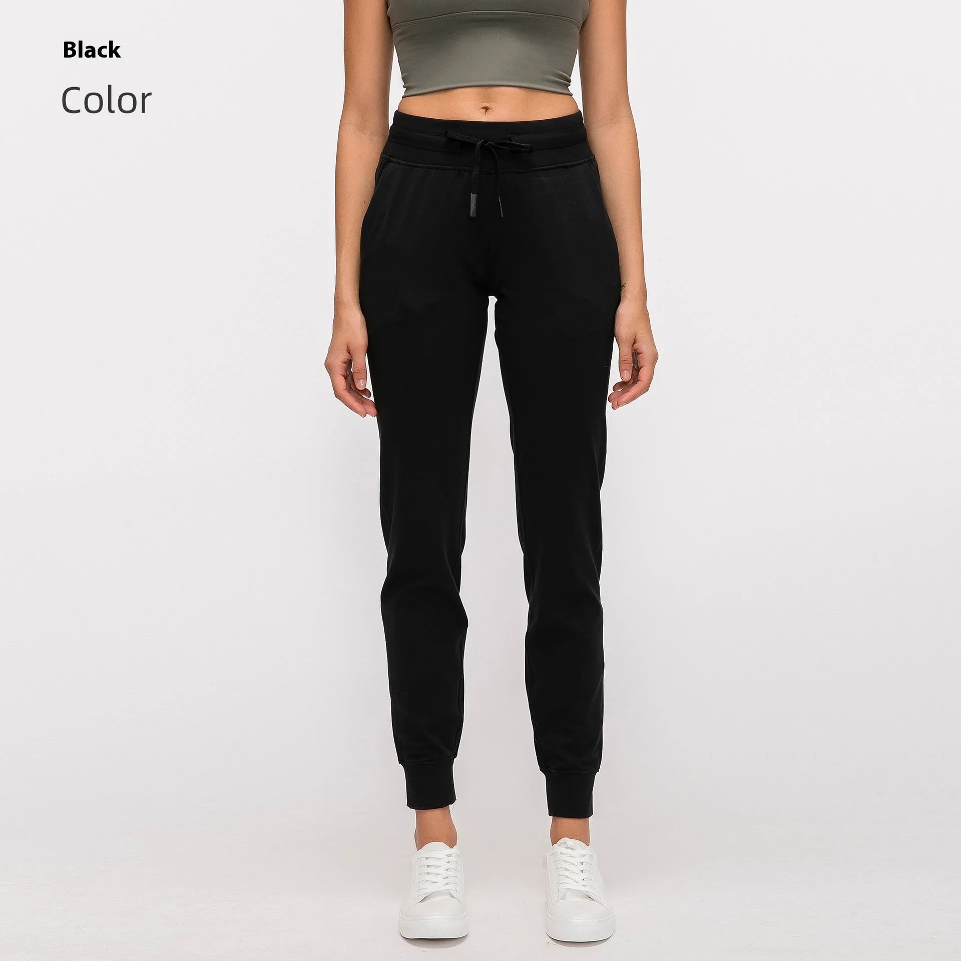 Women's high-waist yoga pants in distilled coffee colour with an elastic drawstring waist for fitness.