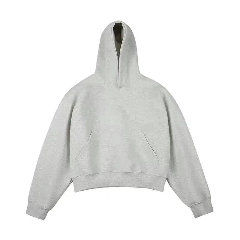 Men's short black Chinese cotton velvet hooded sweater with the hood down on a hanger.