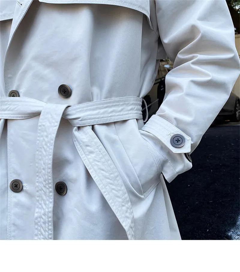 Mid-length trench coat with double-breasted lapels in black, washing finish, 65% cotton 35% polyester