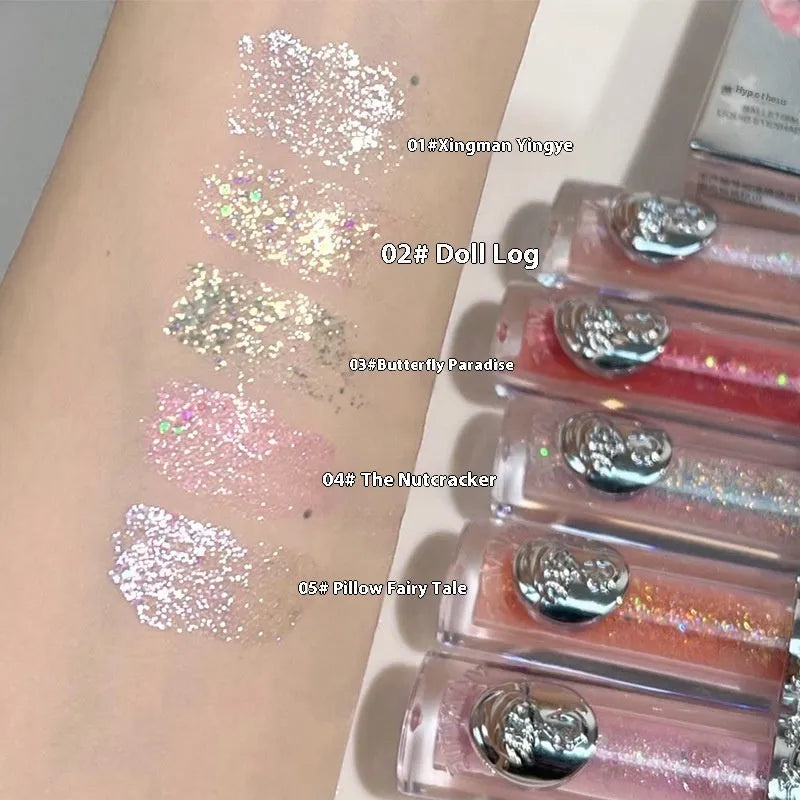 Ballet liquid eye shadow showing five colour options including pink glitter, brown shimmer, purple metallic, nude matte and silver glitter finishes