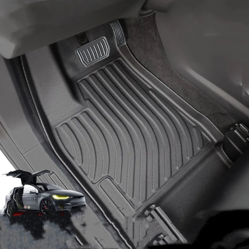 Rubber floor mat set for Tesla Model X showing foot pads and tailbox cushion for interior protection