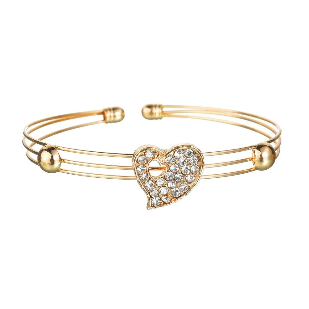 Gold electroplated alloy women's jewellery set with love pendant necklace, earrings and bracelet