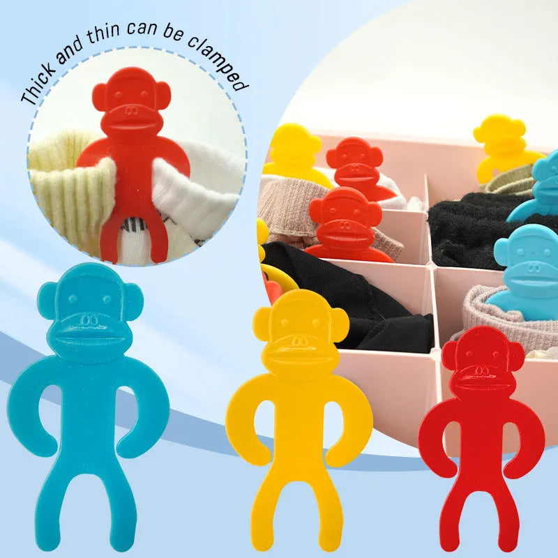 Plastic socks storage clips in blue, yellow and red colours for machine washing organisation