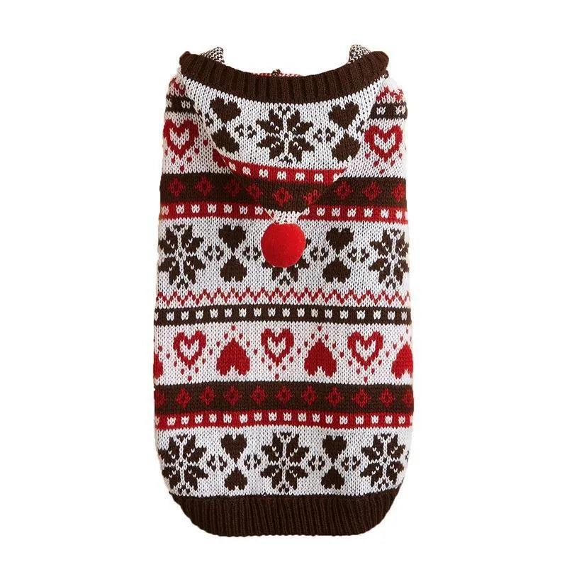 Blue striped camouflage knitted acrylic sweater on a small Bichon dog, showing snowflake and love heart patterns.