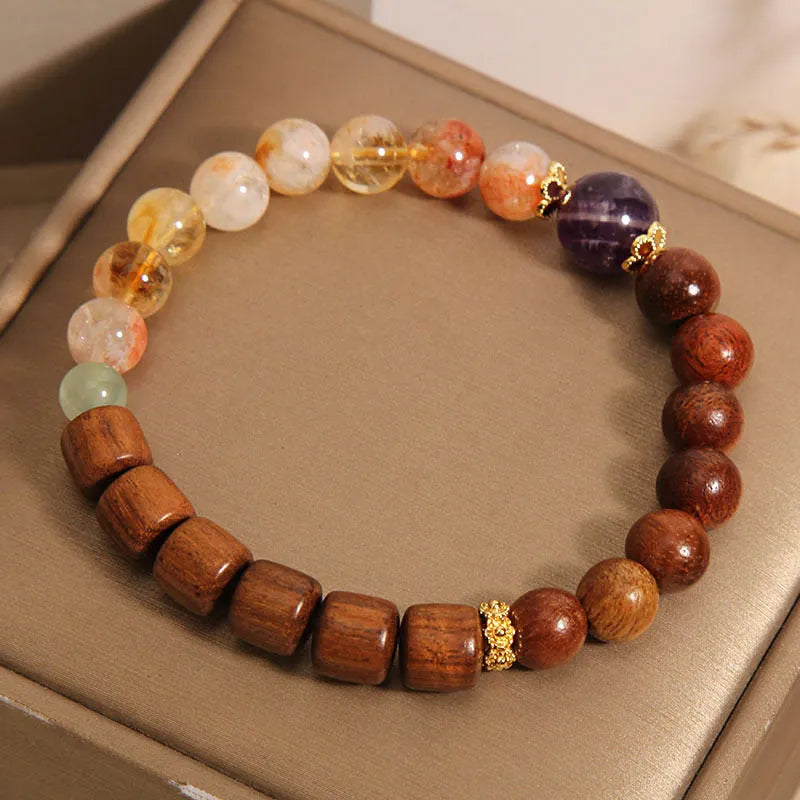 Yellow crystal amethyst bracelet with pearl and rhinestone decorative elements