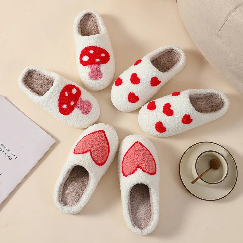 Plush women's slippers in Big Love colour with non-slip PVC sole and round toe.