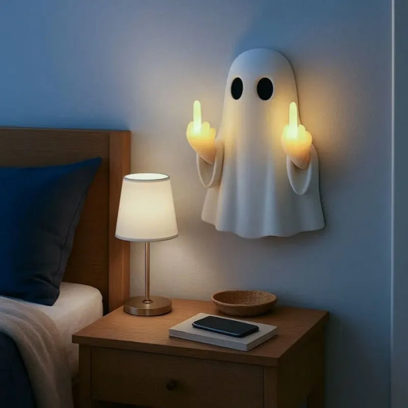 White cute ghost statue night lamp with modern design for Halloween decoration.