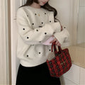 Women's loose crew neck pullover sweater in milky white with love embroidery and long sleeves