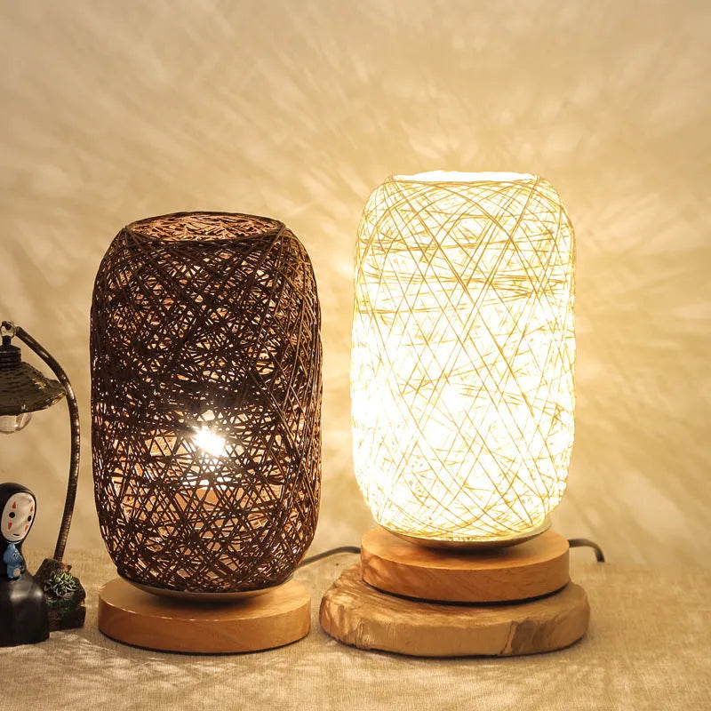 Brown hemp rope Sepak Takraw ball desk lamp with solid wood base on a desk.