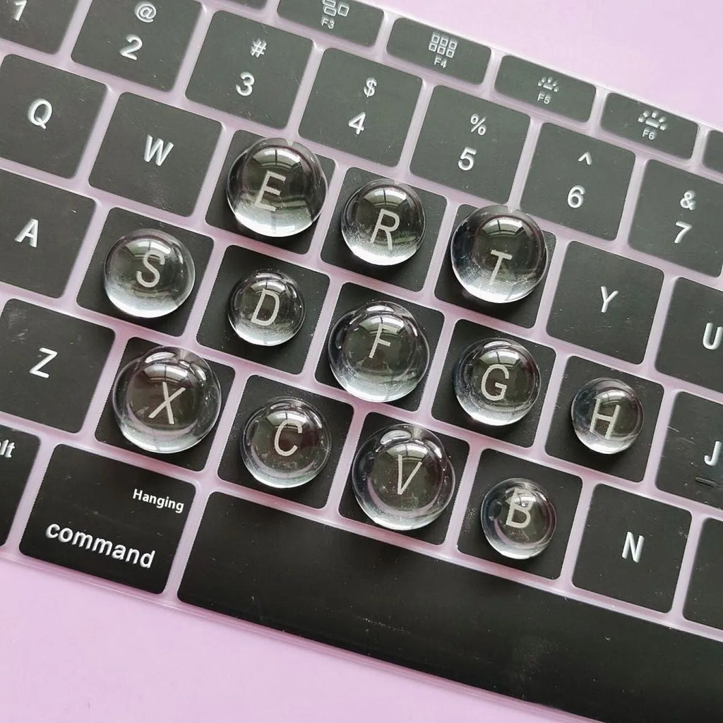 PVC crystal glass ball keyboard stickers in 12x6mm and 16x8mm sizes on a universal keyboard