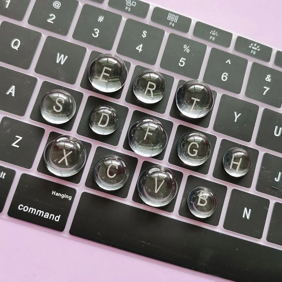 PVC crystal glass ball keyboard stickers in 12x6mm and 16x8mm sizes on a universal keyboard