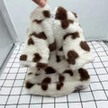 Pink plush warm coat for small dog on white background showing British style design