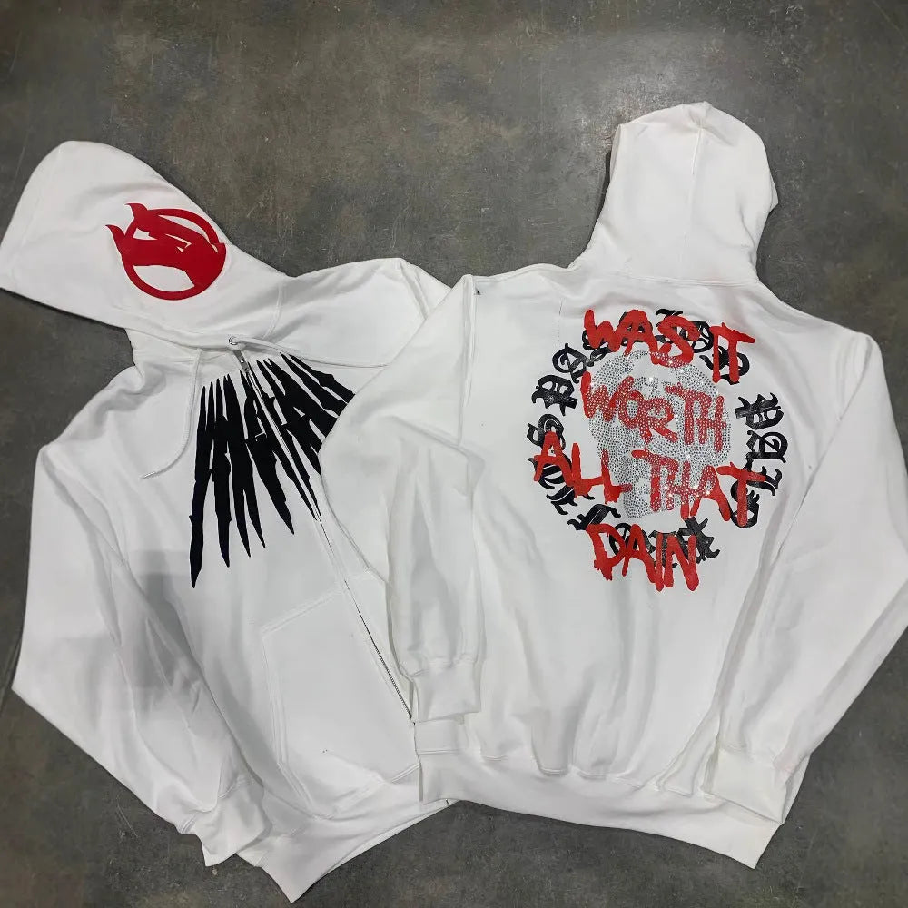 Black loose hooded sweatshirt with white printed skull design and rhinestone details, cardigan style.