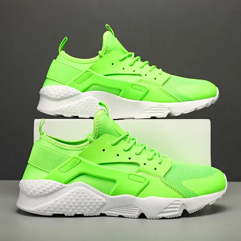 Men's casual low top shoes with mesh upper, cross straps, and flat heel in multiple colours