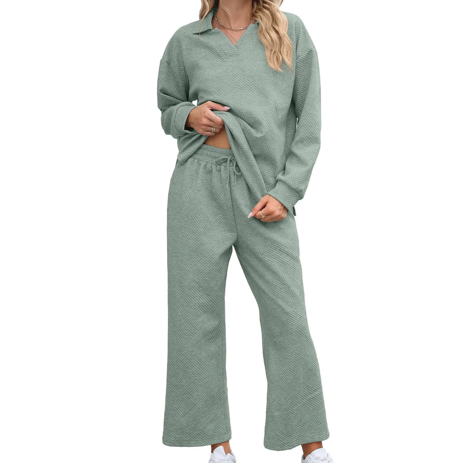 Women's black geometric pattern knitted jacquard long sleeve top and elastic waist cropped pants suit set.