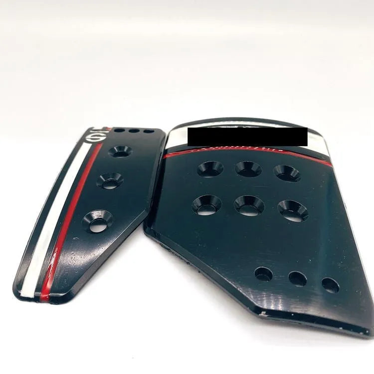 Aluminium manual transmission car pedal set showing brake, accelerator and clutch pedals