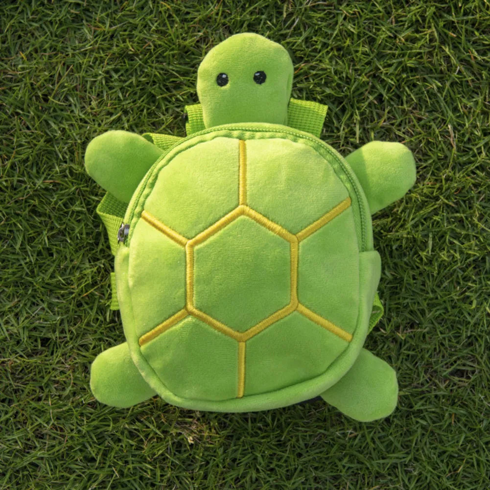 Cartoon turtle shape dog backpack with harness vest in velvet material showing 20x18cm capacity